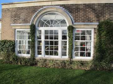 Installation in Barnton Northwick of a be spoke Bygone White wood Vertical sliding window. The client approached our design tem to create PvcU Vertical sliding window that would match as nerd as possible the original windows. Our new Bygone Harmony "timber look a like" vertical sliding window fitted the bill. Our new By gone sliding sash window has al the features you would expect to see on a Timber box sash window. The sliding window is grained to look like timber. Large bottom rails another feature that would be expected on a traditional timber vertical sliding windows. Slim krypton fills units to look like single glass our just a few f the windows features. the installation was carried our by our Cheshire based window and door installation team in 3 days